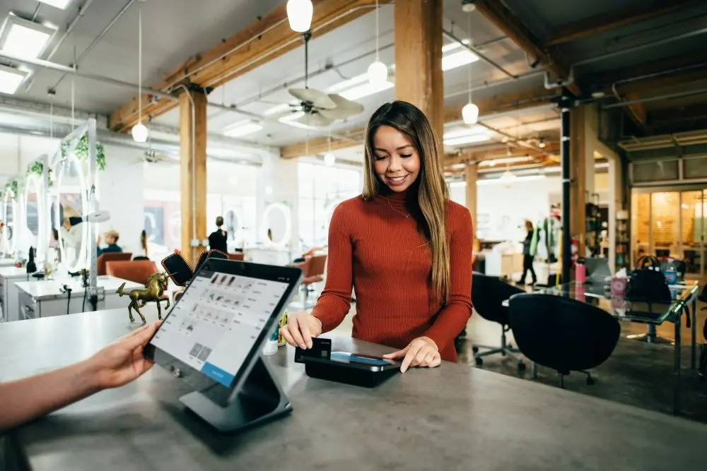Woman paying for item